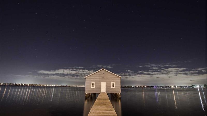 A screenshot comparison showing the simple, clean interface of the standard Coinbase app versus the more complex, data-rich Coinbase Advanced Trade dashboard.