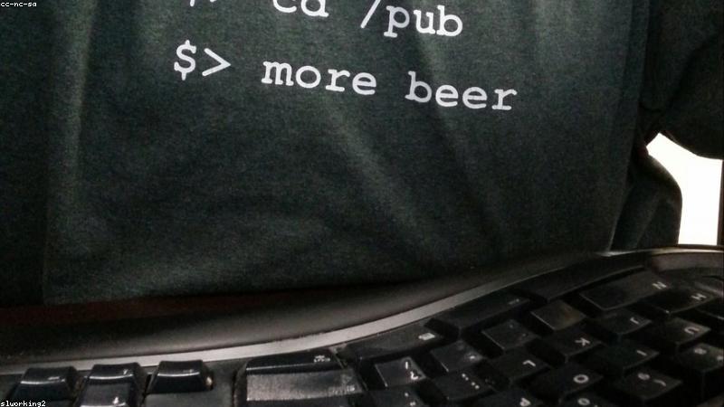 software developer working on curved ultrawide monitor setup