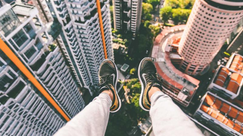 A modern, vibrant digital illustration of young Indian entrepreneurs collaborating around a glowing laptop, symbolizing the startup ecosystem in 2026.