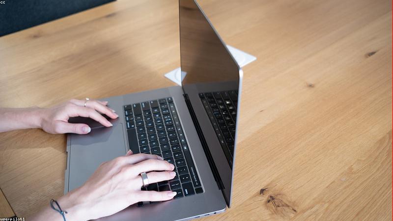 modern home office with bias lighting behind monitor and acoustic panels on wall