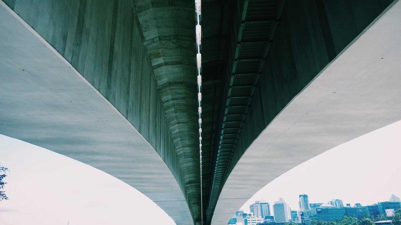 A sleek smartphone displaying a WhatsApp chat interface with the ChatGPT logo integrated into the conversation bubbles, set against a modern tech background.