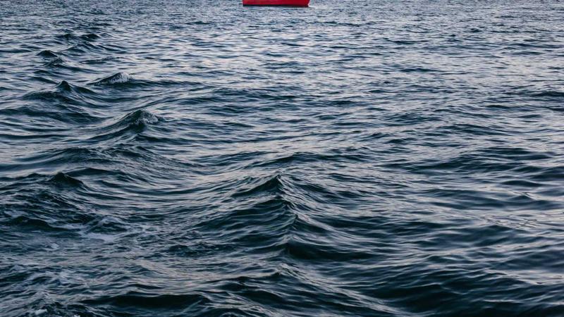 A sleek, modern startup office setup blending into a home office environment, digital icons of productivity tools floating in the air.